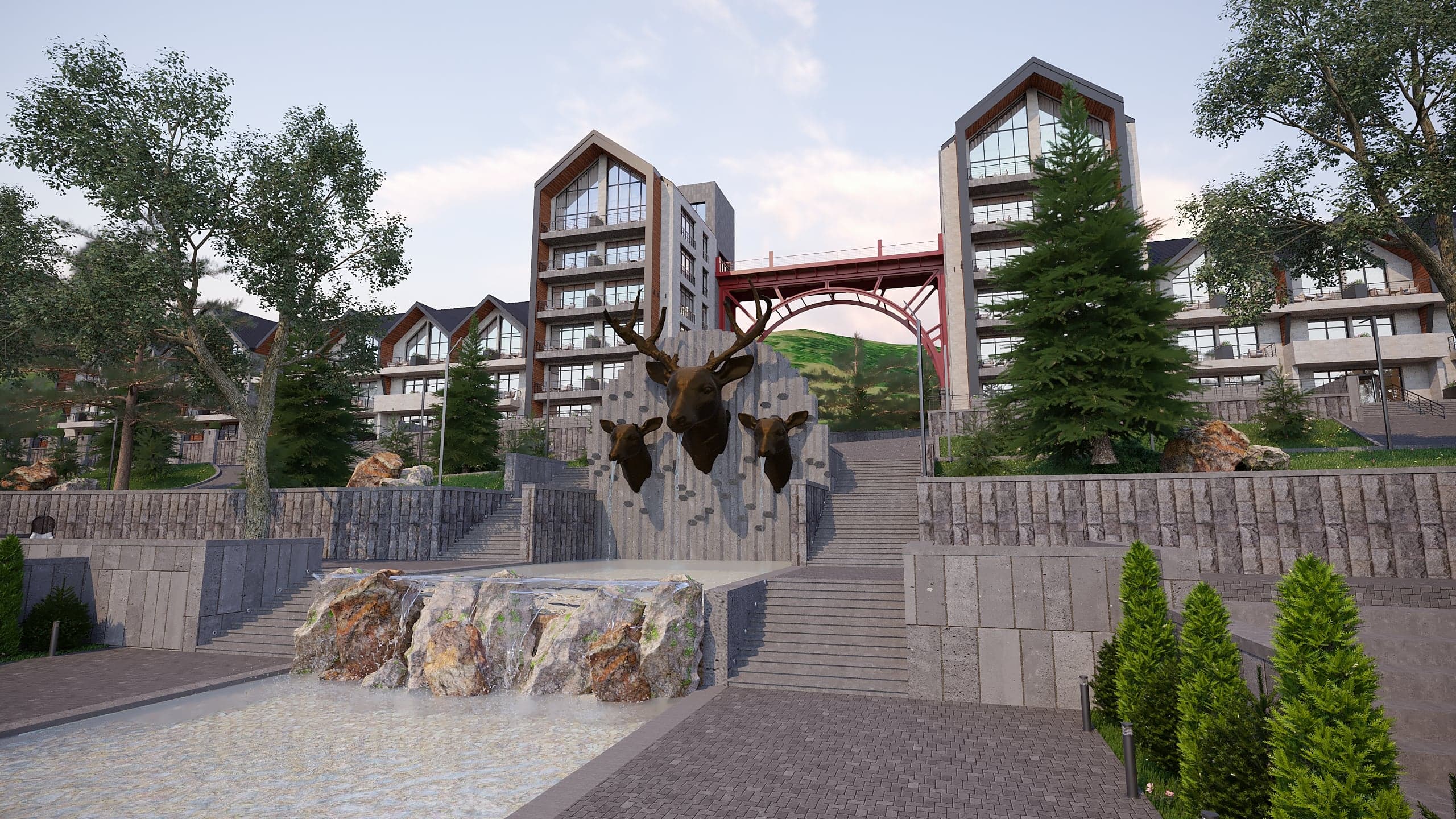 BELLIS Hotel & SPA central plaza at dusk — landscaped water feature framed by the resort's residential towers
