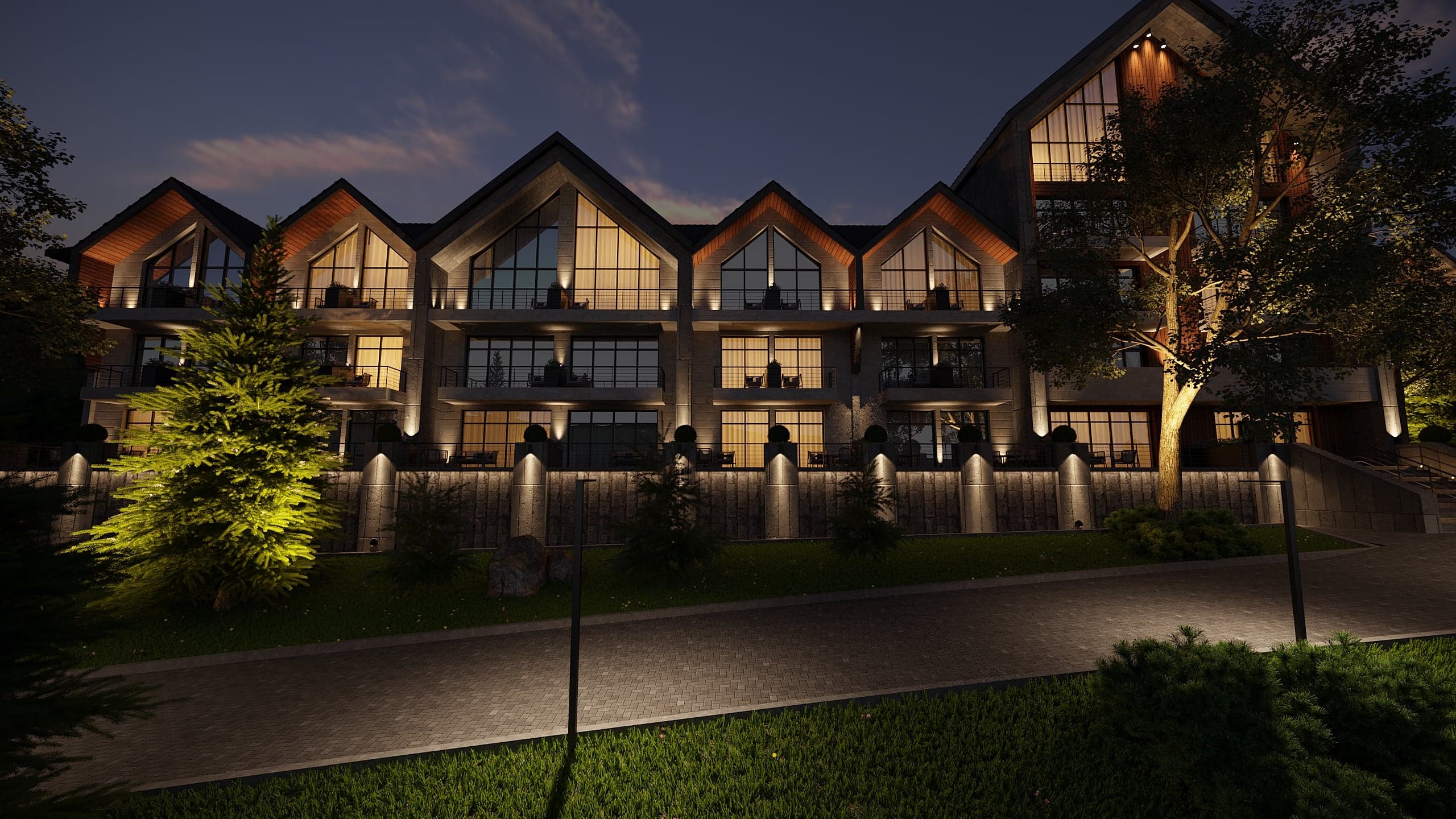 BELLIS Hotel & SPA residential terraces at night — illuminated balconies and stone facade
