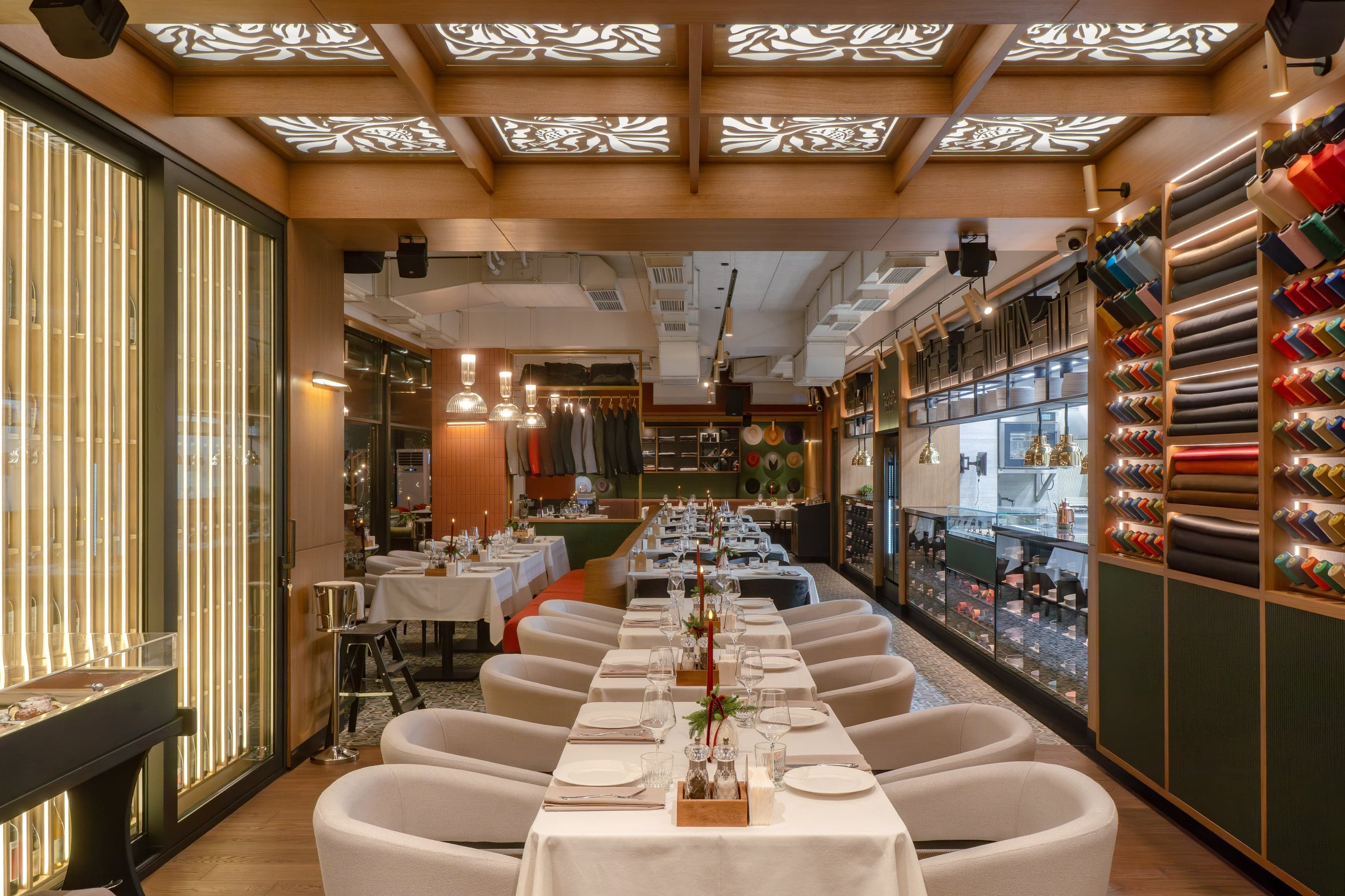 Bold Italic restaurant interior with warm wood paneling and candlelit tables