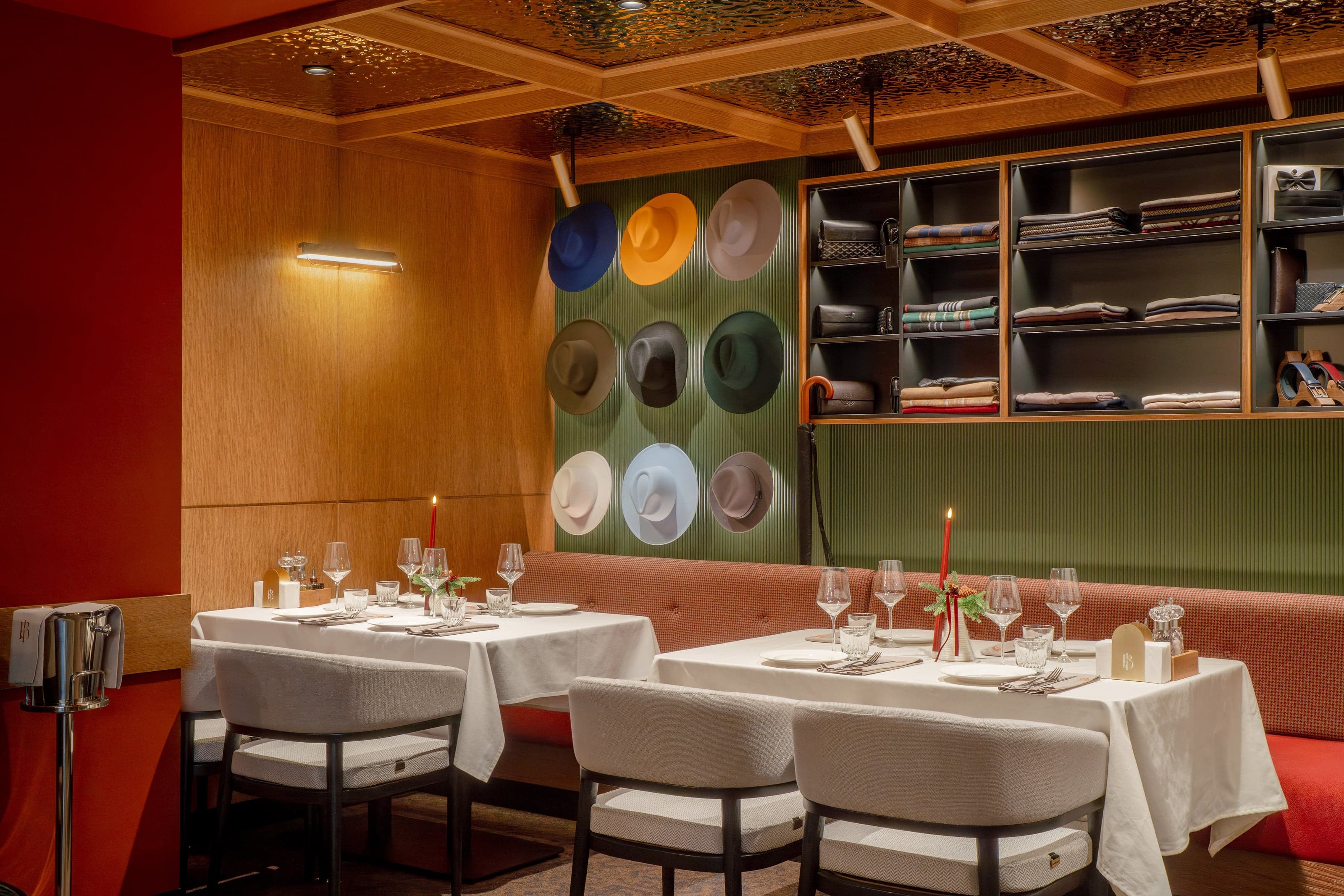 Bold Italic open kitchen and dry-aging display beneath the restaurant's gold signage