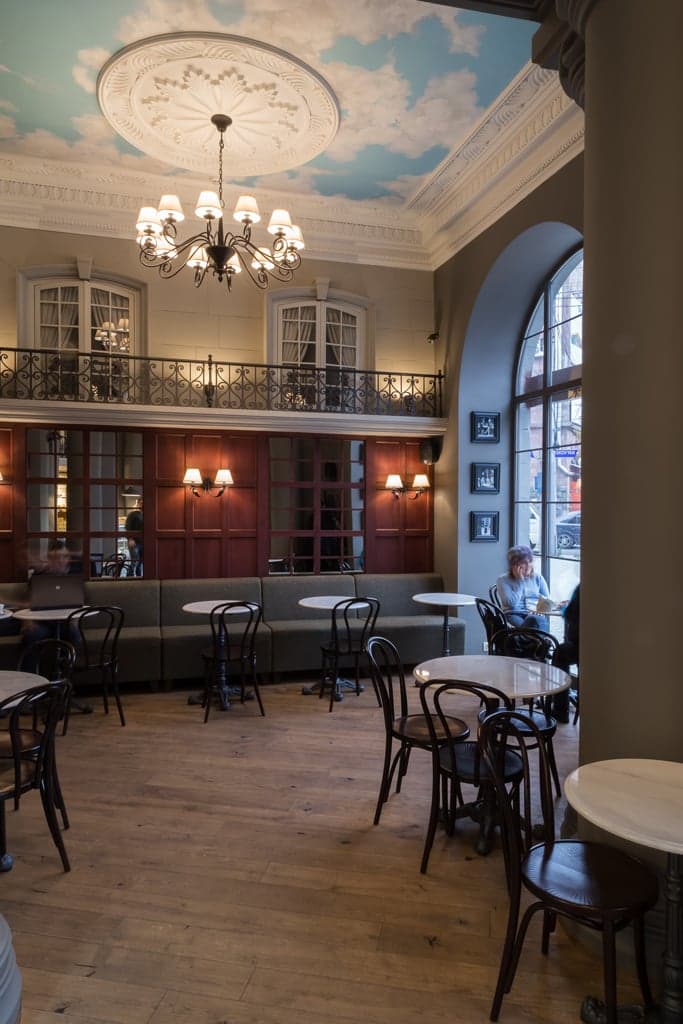 Warm café interior with architectural lighting