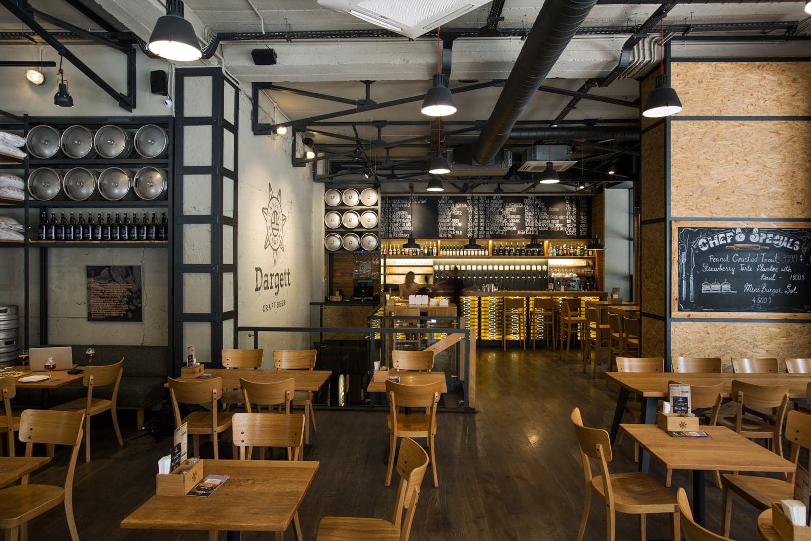 Industrial restaurant architecture with brewing equipment