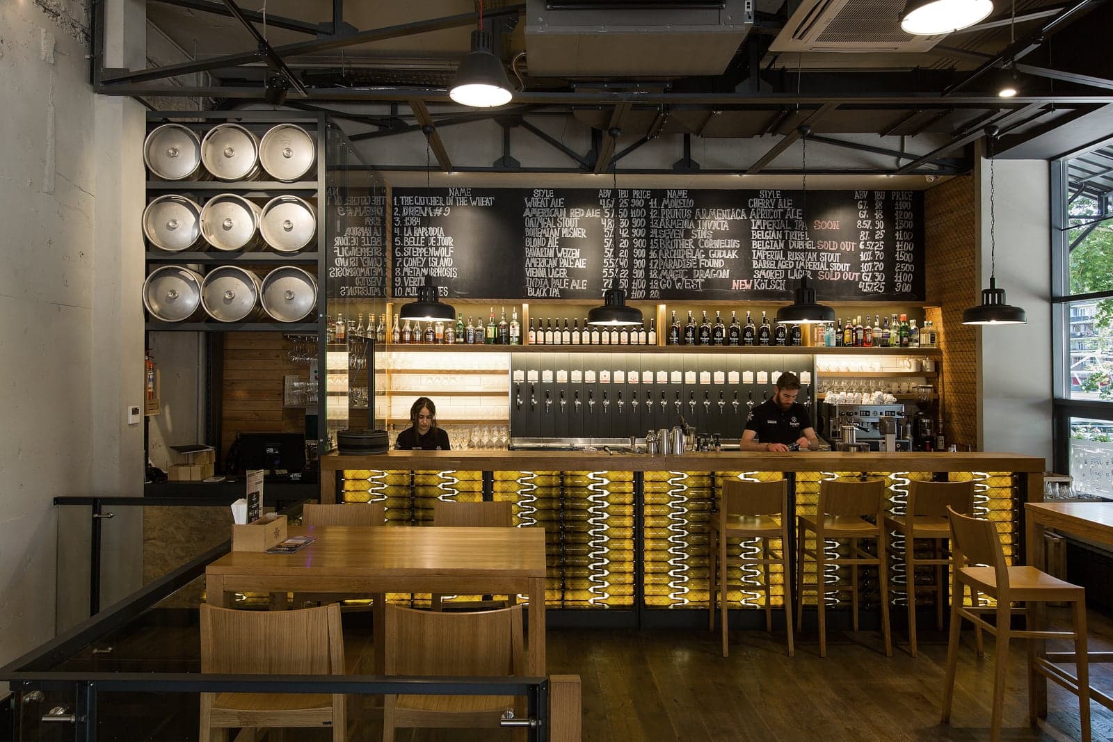 Industrial-inspired restaurant with natural wood and metal finishes