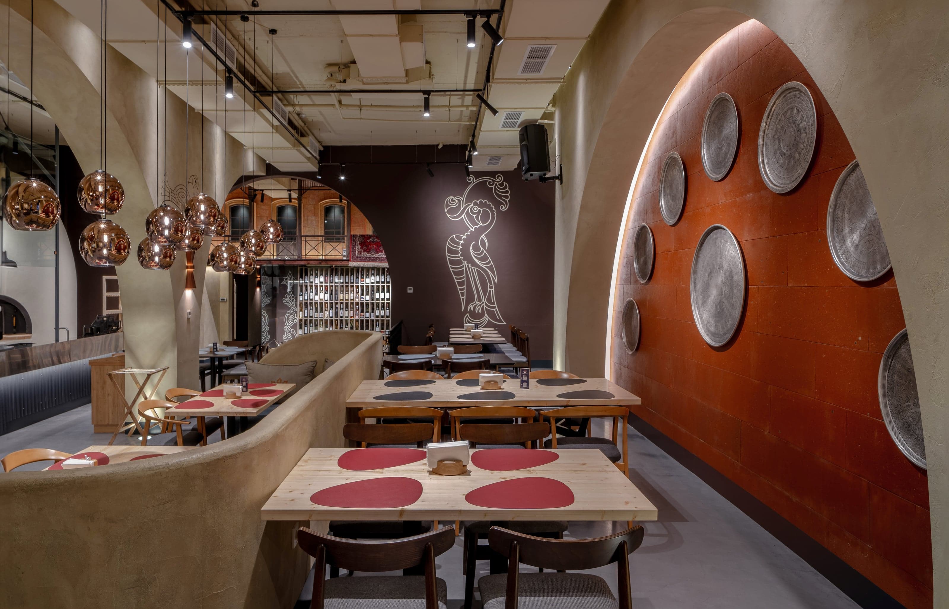 Restaurant interior with natural stone and warm materials