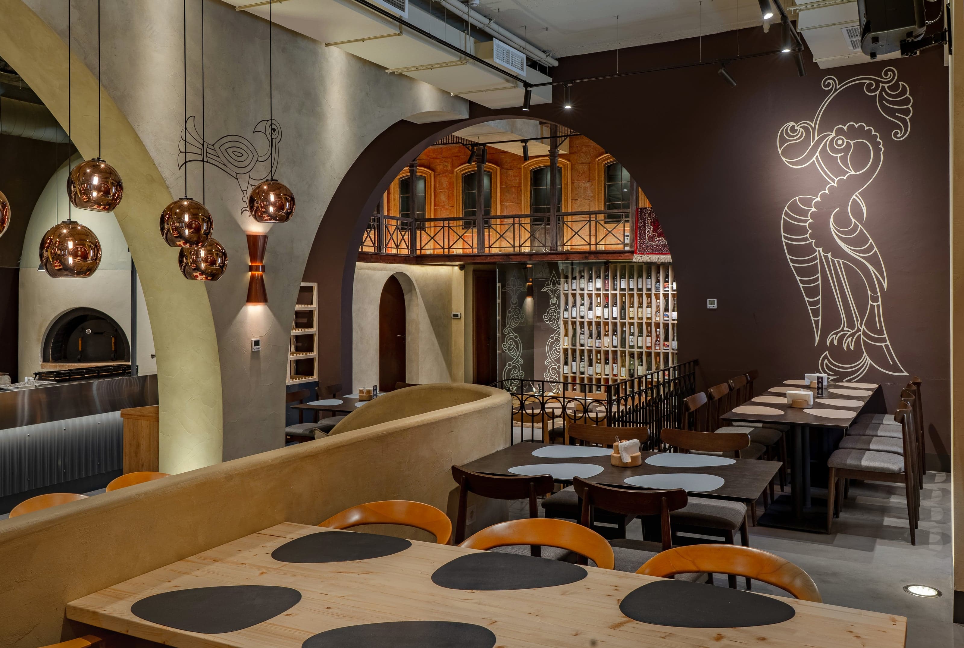 Restaurant interior with natural stone and warm materials