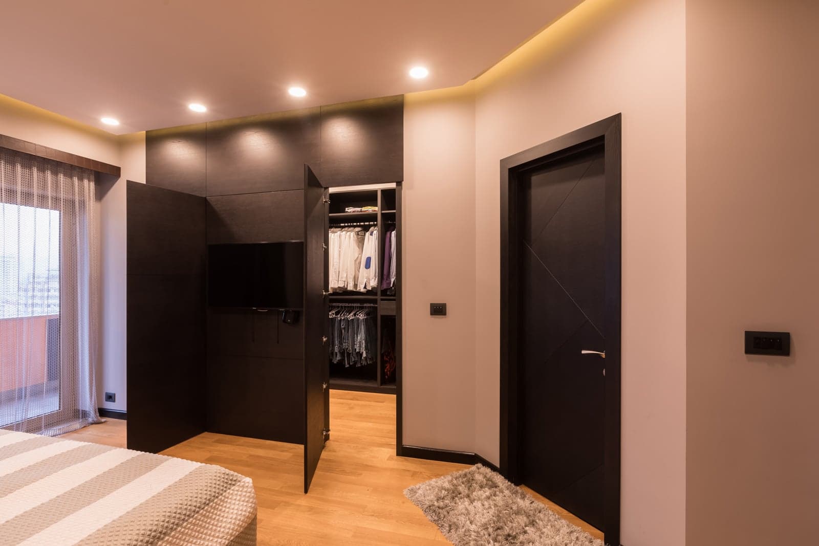 Custom cabinetry and architectural lighting